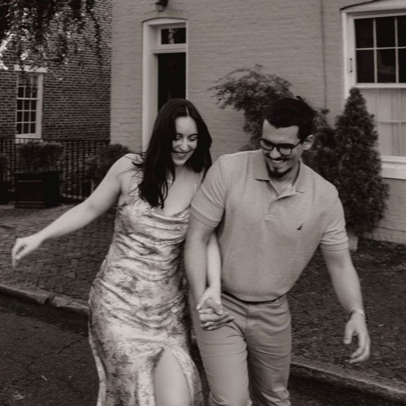 Claire and Alex dancing in the street thinking about dinner